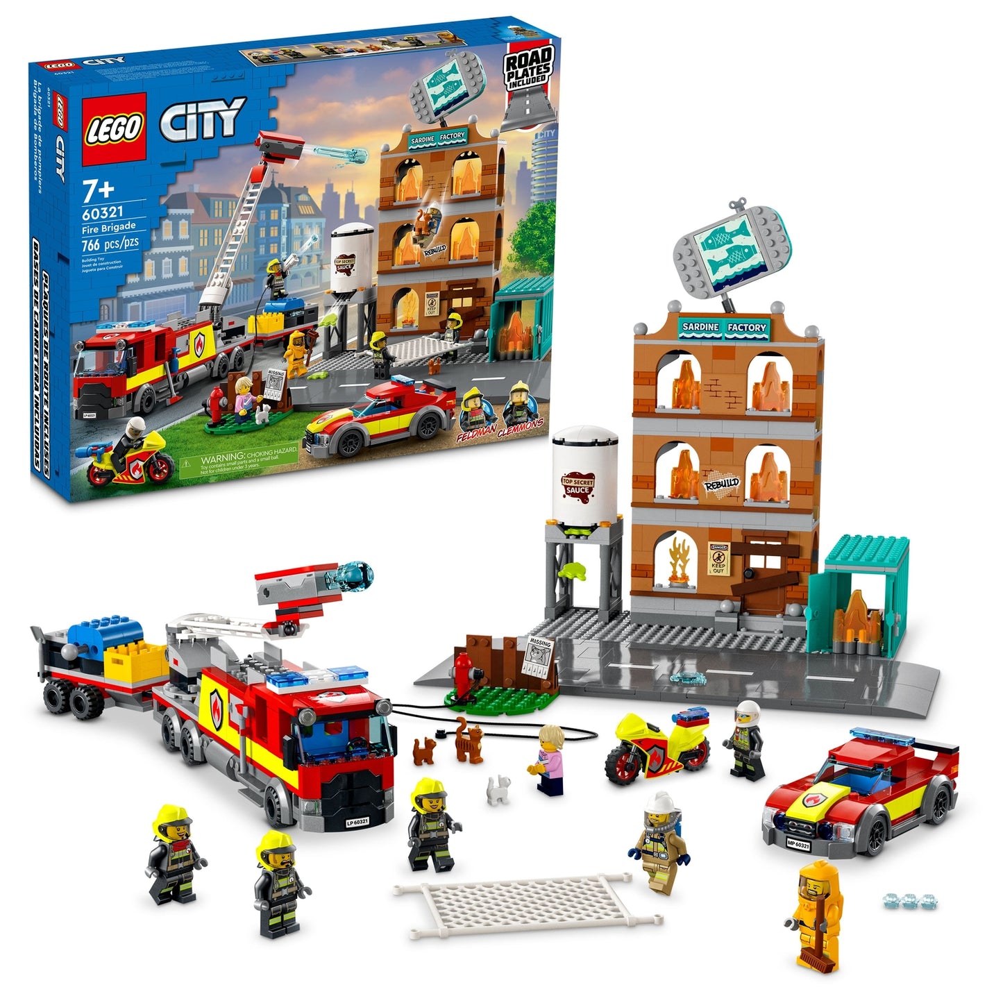 LEGO City set with fire station and vehicles on a white background